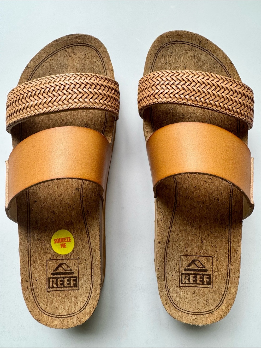 Reef Women’s Cushion Vista Hi Slide  Sandal in Natural Braid.